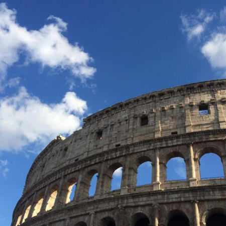 romecolosseo_mlleone The Roman Colosseo against a bright blue sky.